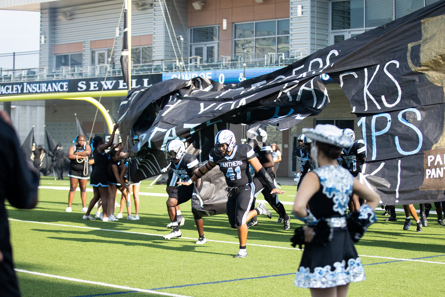 Paetow takes the field for its game against Conroe at Legacy Stadium on Friday.